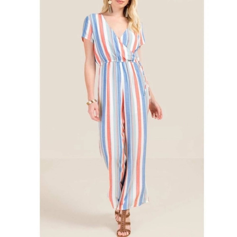 Francesca’s NWT Kora Blue Rain Jumpsuit